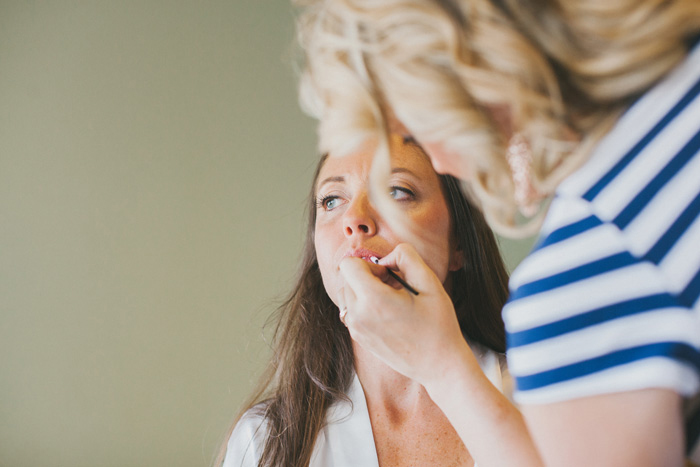 bride getting her make-up done