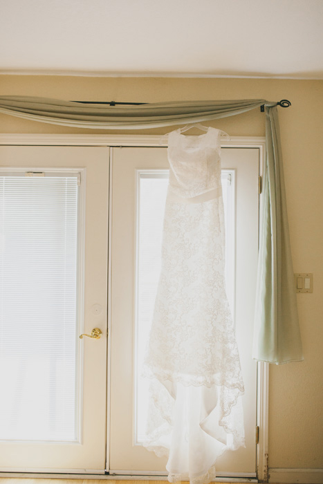 wedding dress hanging up