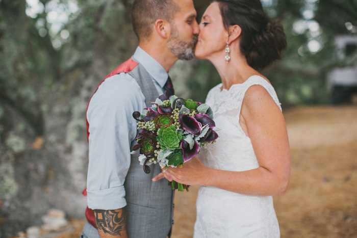 bride and groom kissing