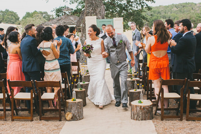 bride and groom walking down the aisle