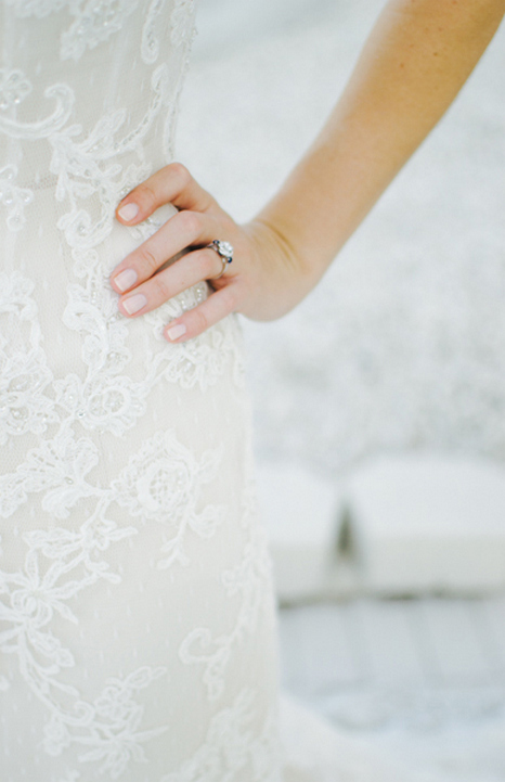 bride's hand on hip