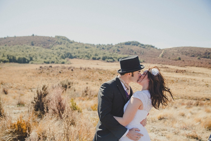 bride and groom first kiss