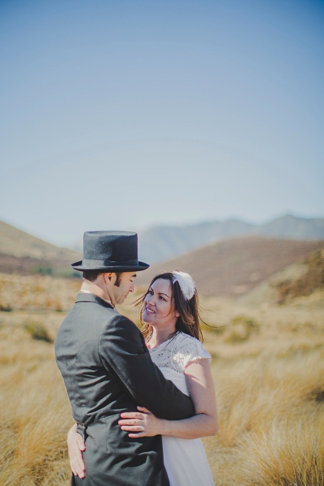 bride and groom embracing