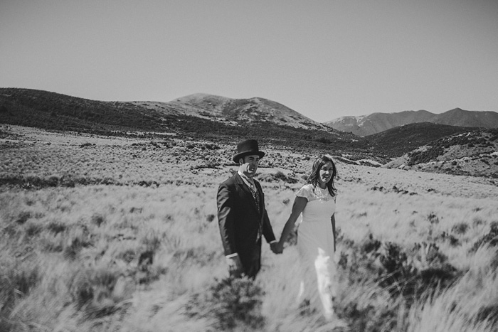 bride and groom walking hand in hand