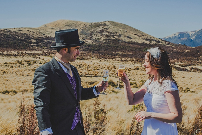 bride and groom toasting