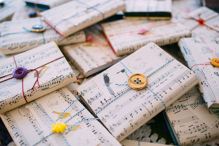 sheet music wrapped guest favors