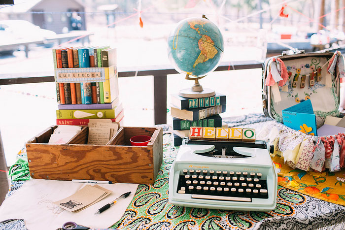 typewriter and globe wedding decor