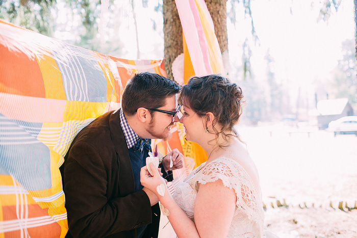 bride and groom with garland