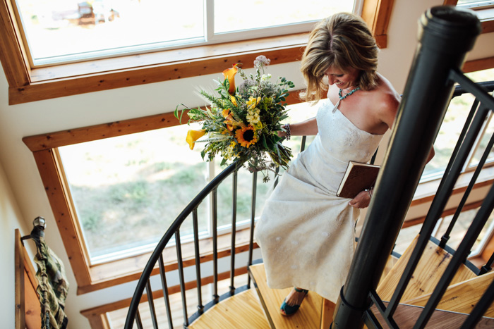 bride walking down cabin staircase