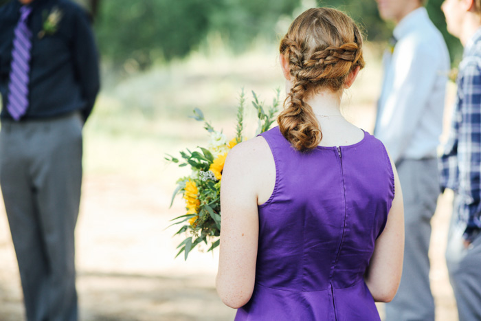 maid of honor in purple dress