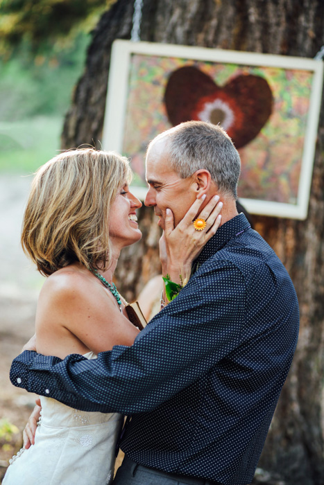 bride and groom about to kiss