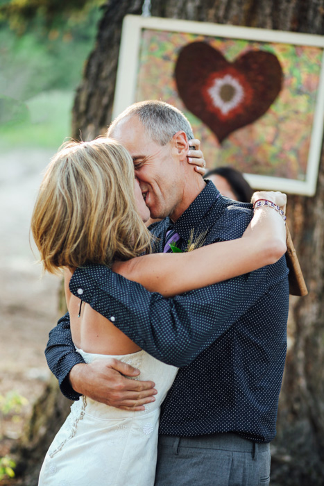 bride and groom first kiss