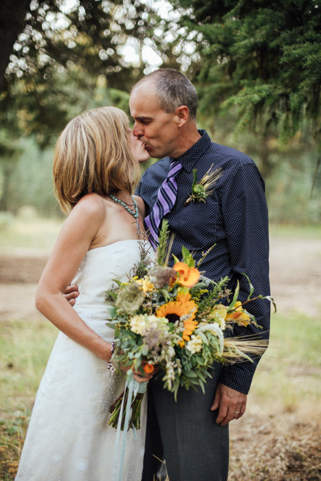 bride and groom kissing