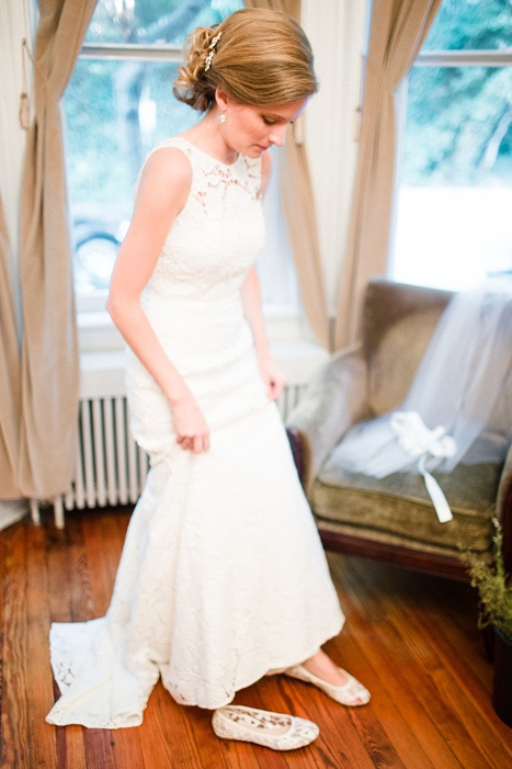 bride putting on shoes