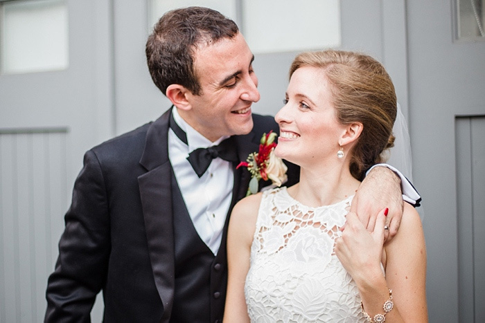 smiling bride and groom