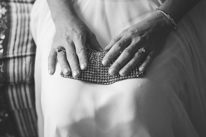 bride holding clutch