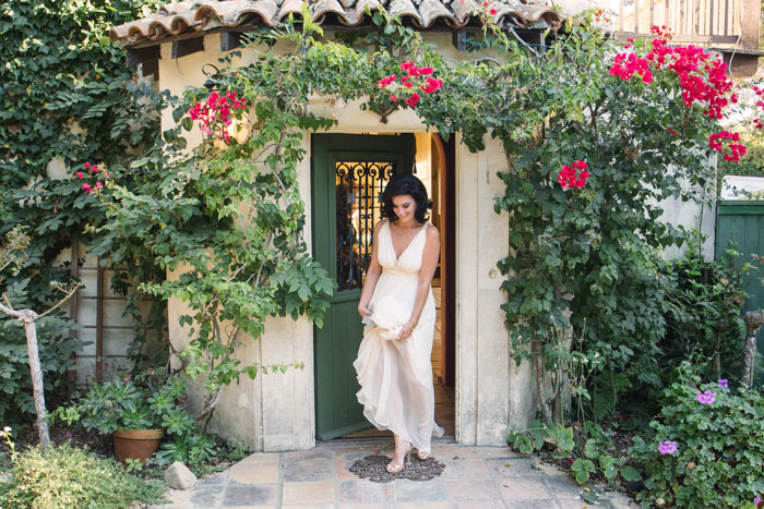 bride walking out of house