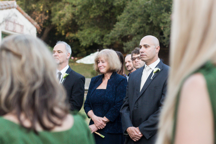 wedding guests watching ceremony