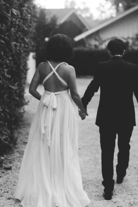 bride and groom walking to ceremony