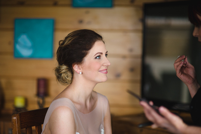 bride getting her makeup done