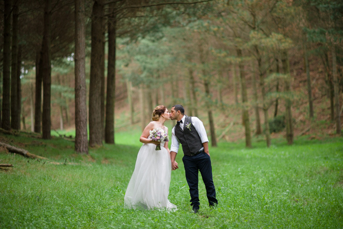 bride and groom kissing