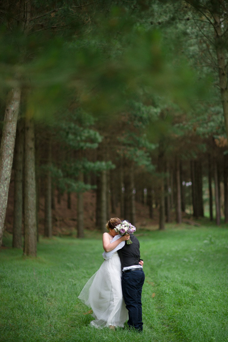 bride and groom hugging