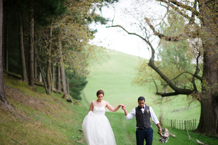 bride and groom walking outdoors