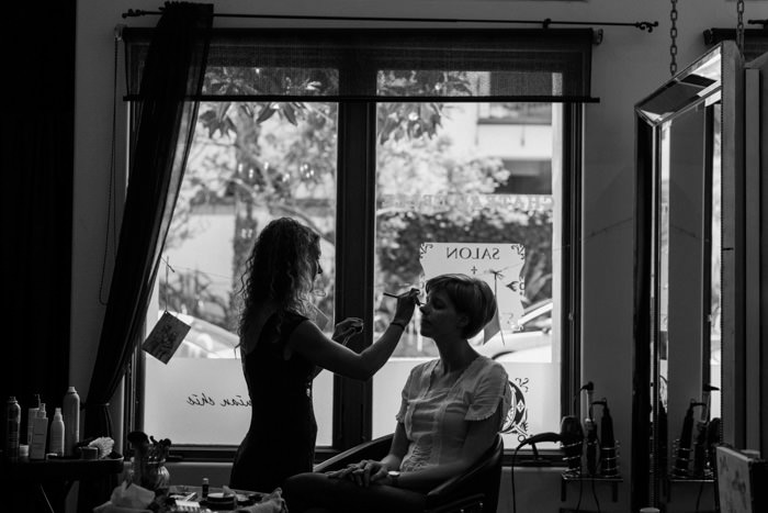 bride getting make-up done