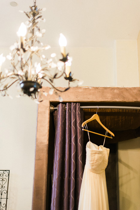 wedding dress hanging up