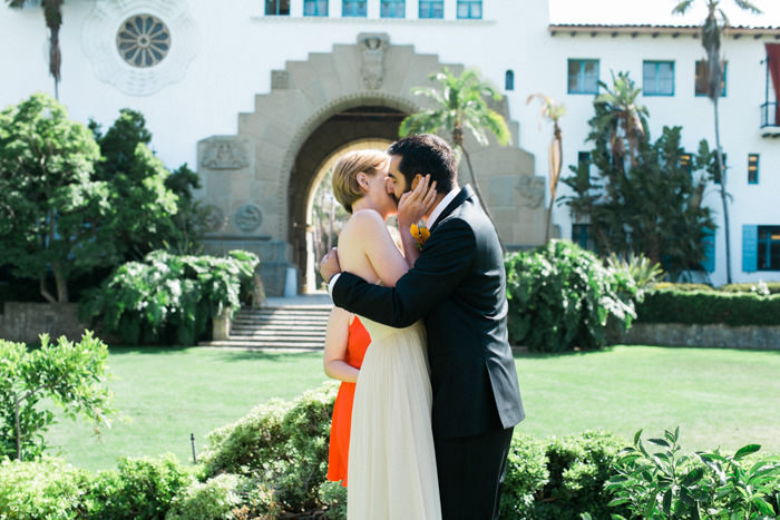 bride and groom first kiss