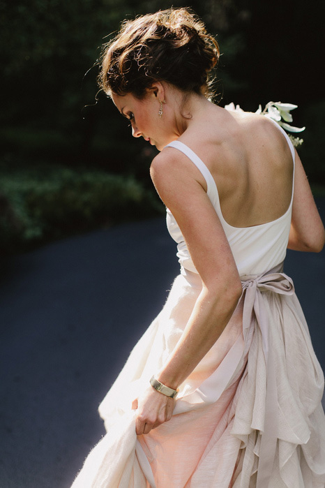 bride adjusting dress