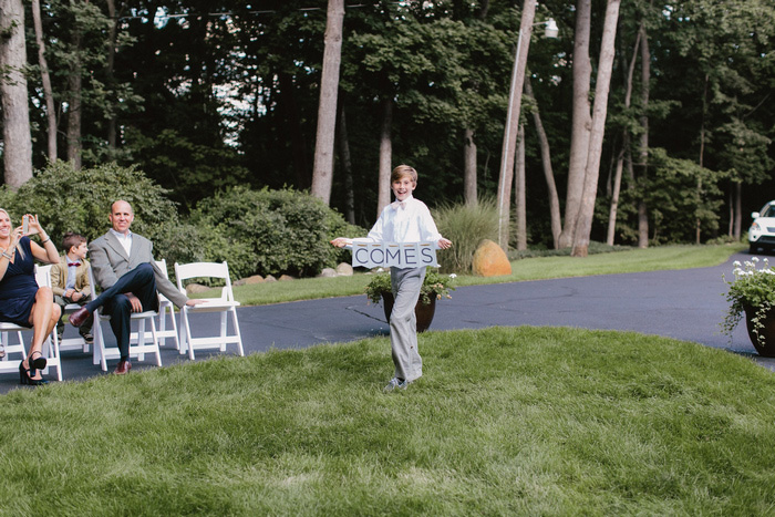 ring bearer walking down aisle