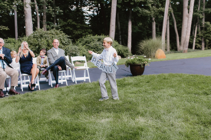 ring bearer walking down aisle