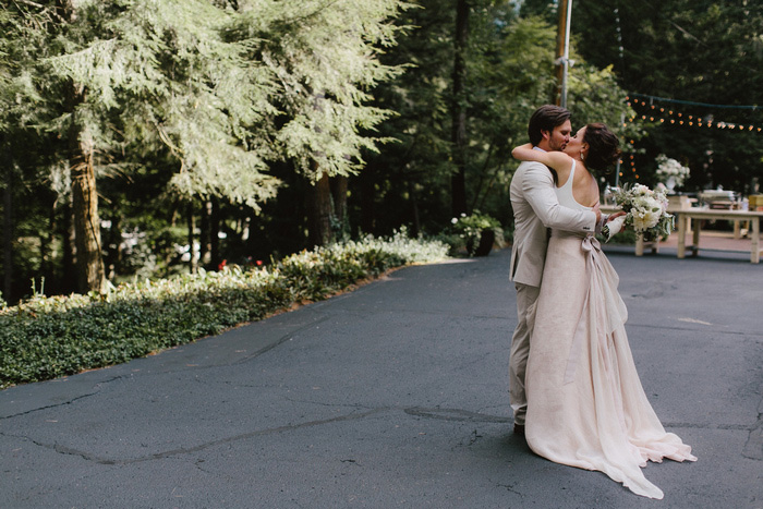 bride and groom kissing