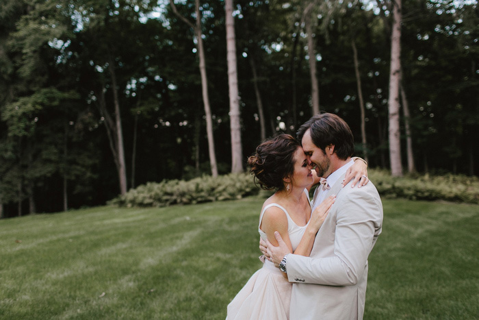 bride and groom hugging