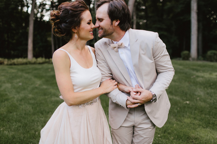 bride and groom touching noses