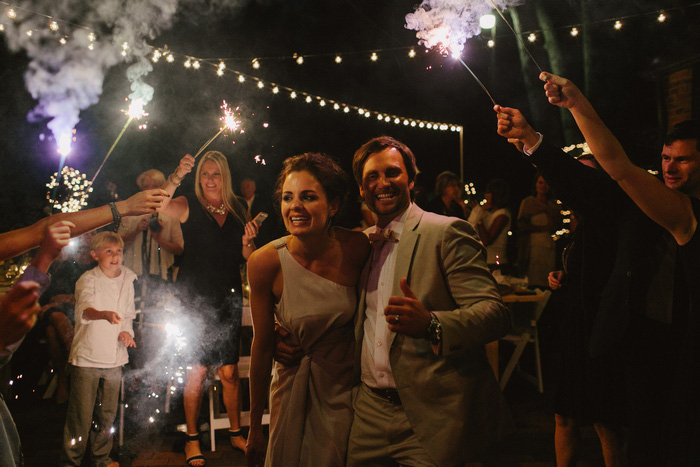 bride and groom with sparkler send-off