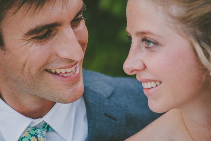 groom looking adoringly at bride