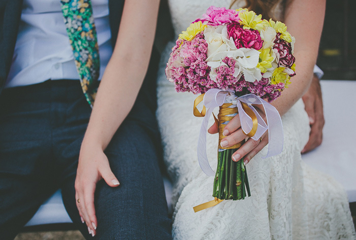 bride and groom sitting