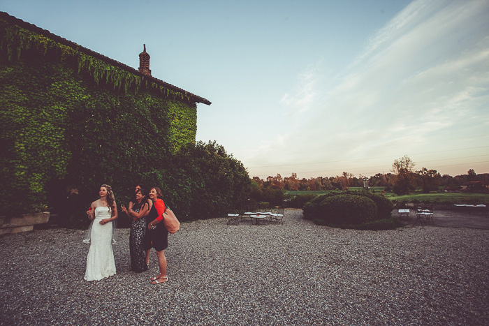 bride chatting with wedding guests