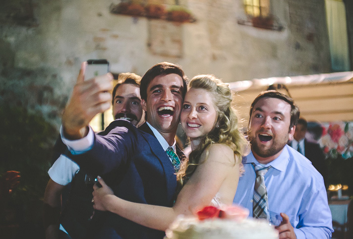 bride and groom taking a selfie