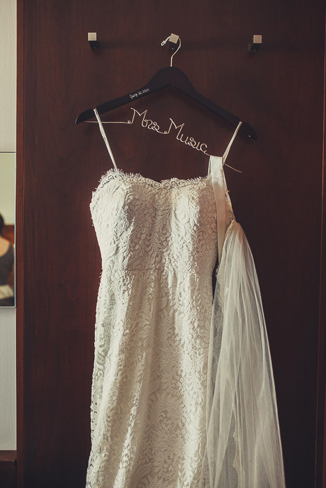 wedding dress hanging on custom hanger
