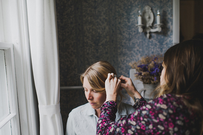 bride getting hair done