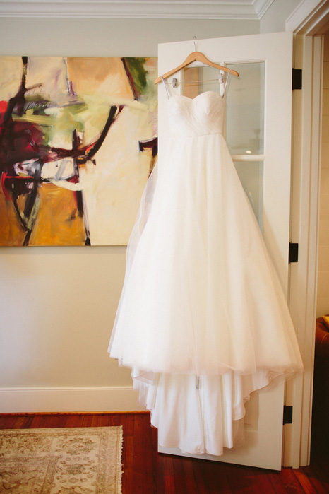 wedding dress hanging up