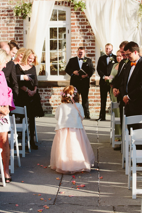 flower girl walking down aisle