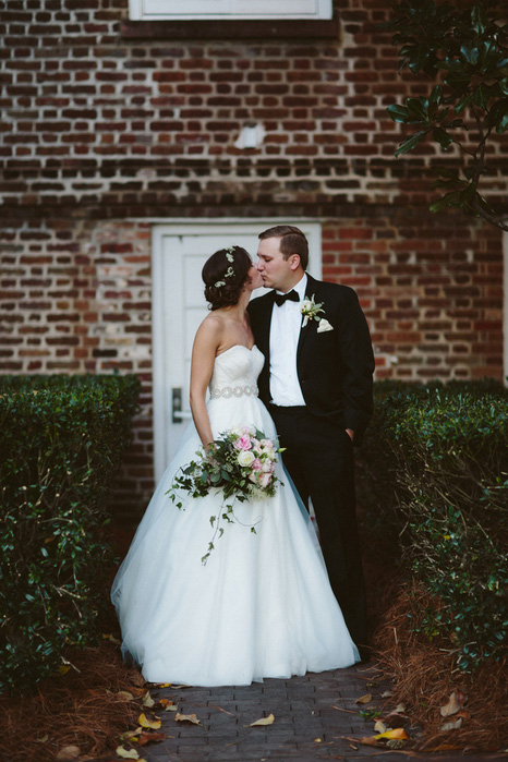 bride and groom kissing