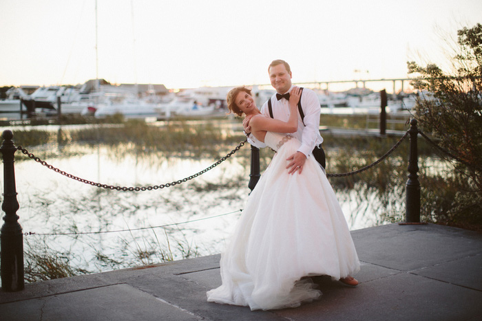 groom dipping bride