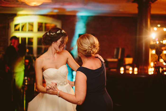 bride dancing with guest