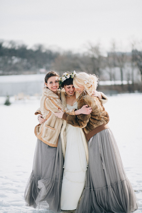 bride and bridesmaids in fur coats