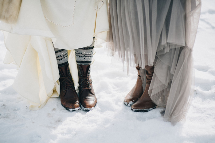 bride and bridesmaid in boots and socks